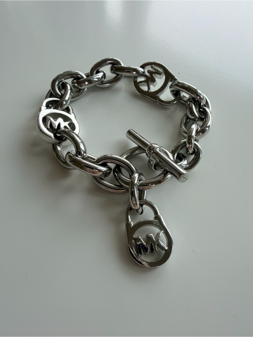 Michael Kors Polished Silver-Tone MK Charm Chain Bracelet - Picture 4 of 5